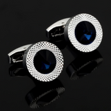 Embossed metal men's cufflinks with a crystal in silver/gold.