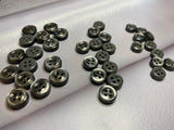 Colored children's buttons for clothes, toys, needlework. Set of 10 pieces