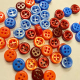 Colored children's buttons for clothes, toys, needlework. Set of 10 pieces