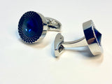 Embossed metal men's cufflinks with a crystal in silver/gold.