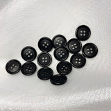 Classic matte black buttons with 4 holes for coats, jackets and other clothes. Set of 6 pieces