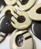 Beige-brown plastic round buttons with an interesting design for sewing coats, 28mm. Set 4 pieces